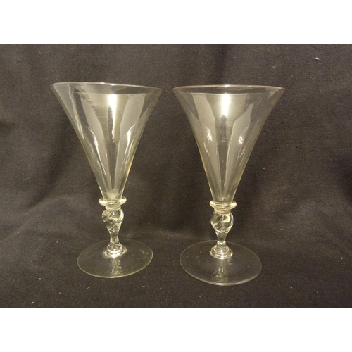 210 - A pair of Facon de Venise wine glasses, of conical bowl on spiral twist propeller knopped stems and ... 