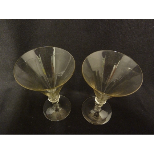 210 - A pair of Facon de Venise wine glasses, of conical bowl on spiral twist propeller knopped stems and ... 