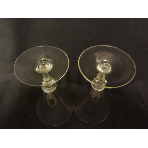 210 - A pair of Facon de Venise wine glasses, of conical bowl on spiral twist propeller knopped stems and ... 