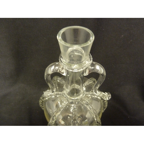 204 - A Dutch glass flask decanter, of globe and shaft form with bands of rigaree, 23 cm high approx.