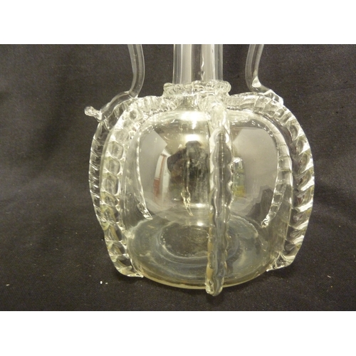 204 - A Dutch glass flask decanter, of globe and shaft form with bands of rigaree, 23 cm high approx.