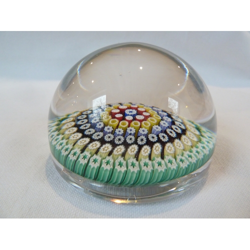 26 - Whitefriars Limited - A glass paperweight, with date cane for 1974, blue and turquoise colours about... 