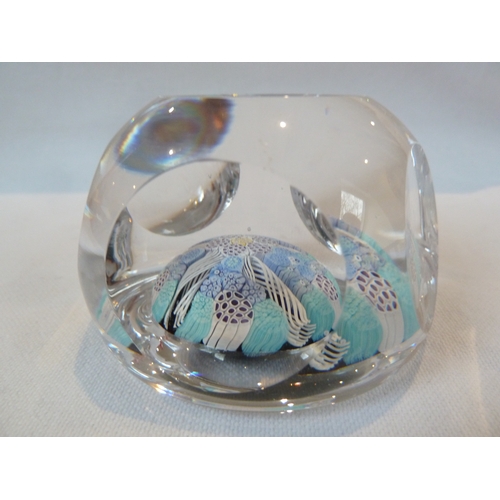 26 - Whitefriars Limited - A glass paperweight, with date cane for 1974, blue and turquoise colours about... 