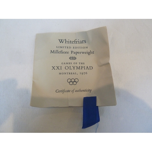 23 - Whitefriars Limited - A glass paperweight commemorating the Games of the XXI Olympiad, Montreal 1976... 