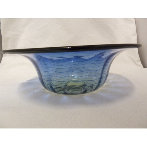 10 - James Powell and Son, Whitefriars Limited - A blue thread on sea green ground glass bowl, 26cm diam.