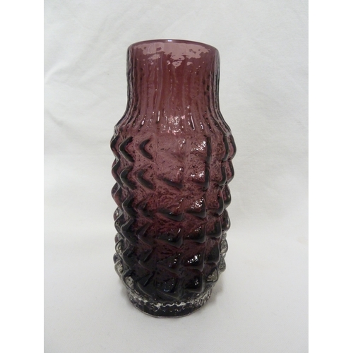 12 - Geoffrey Baxter for Whitefriars Limited - A basket weave glass vase in aubergine colour, 18cm high