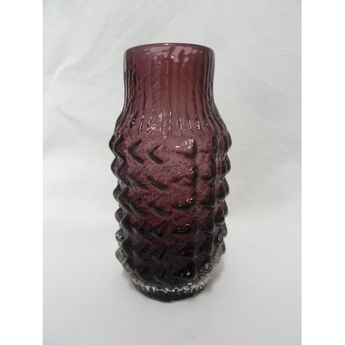 12 - Geoffrey Baxter for Whitefriars Limited - A basket weave glass vase in aubergine colour, 18cm high