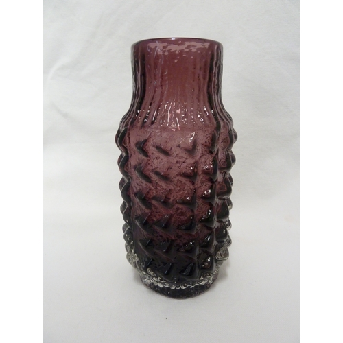 12 - Geoffrey Baxter for Whitefriars Limited - A basket weave glass vase in aubergine colour, 18cm high