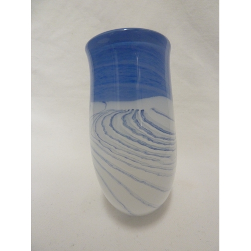 152 - Peter Layton - A studio glass vase decorated with a snowy landscape, signed to base, 15cm high.