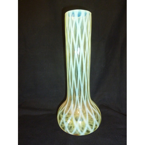 6 - James Powell and Sons, Whitefriars Limited - A large straw opal lattice glass vase; and two other la... 