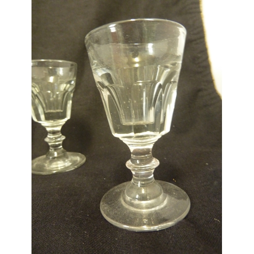 198 - A set of six Victorian toasting glasses, the panelled bowls with deceptive interior on bladed knop s... 