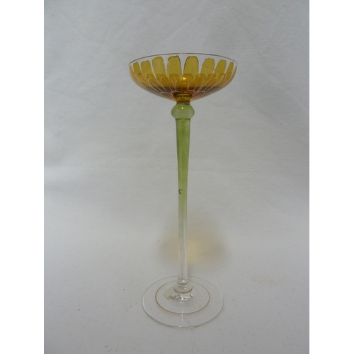 51 - A Continental Art Nouveau liqueur glass, finely enamelled to resemble a single yellow aster flower, ... 