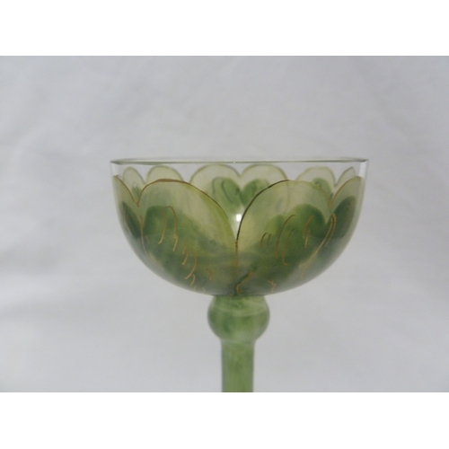 53 - A Continental Art Nouveau liqueur glass, finely enamelled in green to resemble a buttercup flower, p... 