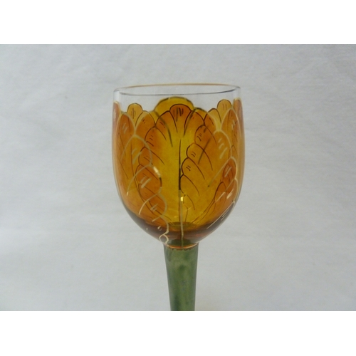 60 - A Continental Art Nouveau liqueur glass, finely enamelled in yellow to resemble a tulip flower, Meyr... 