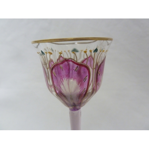 68 - A Continental Art Nouveau liqueur glass, finely enamelled in purple/pink to resemble an open crocus ... 