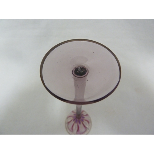 68 - A Continental Art Nouveau liqueur glass, finely enamelled in purple/pink to resemble an open crocus ... 