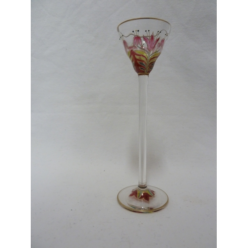 70 - A Continental Art Nouveau liqueur glass, finely enamelled in polychrome colours to resemble a group ... 