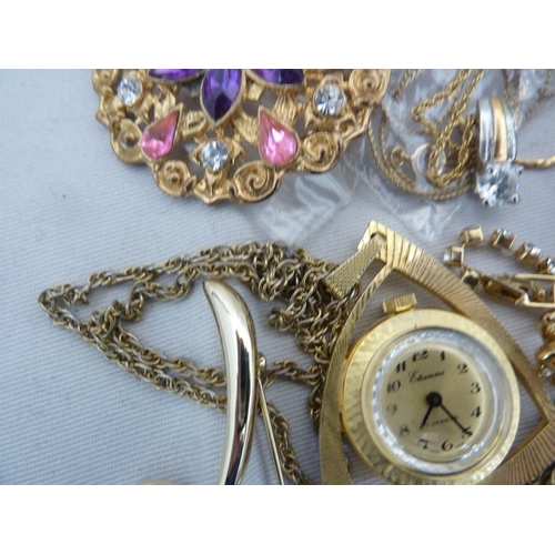 30 - A quantity of gold plated costume jewellery, including a feather form brooch set with glass and pear... 