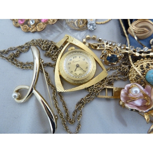 30 - A quantity of gold plated costume jewellery, including a feather form brooch set with glass and pear... 