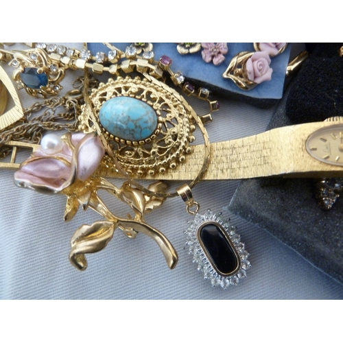 30 - A quantity of gold plated costume jewellery, including a feather form brooch set with glass and pear... 