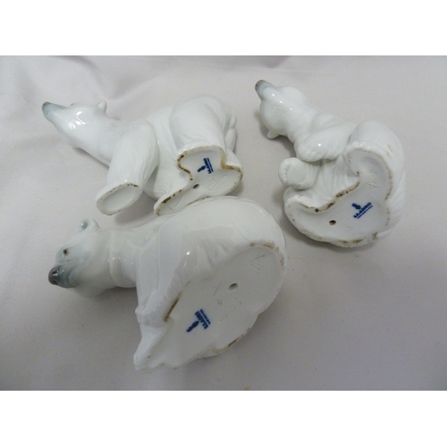 64 - Three Lladro figures of polar bears in various poses, 11.5cm max high, printed factory marks (3)