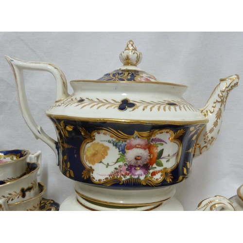 74 - An English porcelain tea and coffee service, in Coalport style, painted with mirror form cartouches ... 