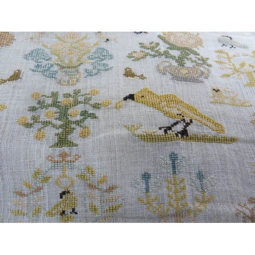 115 - A part late 18th century sampler, dated 1794, worked with designs of birds, pot plants trees and pea... 