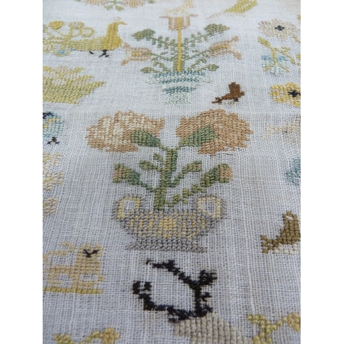 115 - A part late 18th century sampler, dated 1794, worked with designs of birds, pot plants trees and pea... 