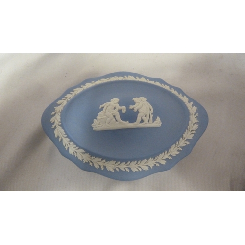 131 - Wedgwood Jasper - comprising; loving cup; a rounded square box and cover; a bombe shaped box and cov... 