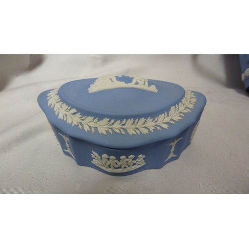 131 - Wedgwood Jasper - comprising; loving cup; a rounded square box and cover; a bombe shaped box and cov... 