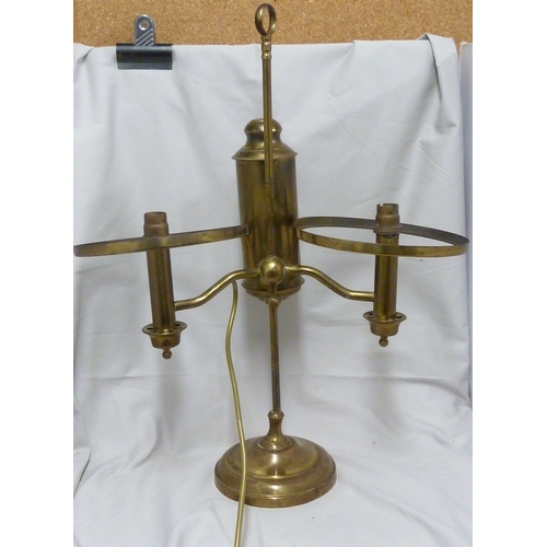 133 - A brass finish reproduction students lamp, with adjustable height two light arms.