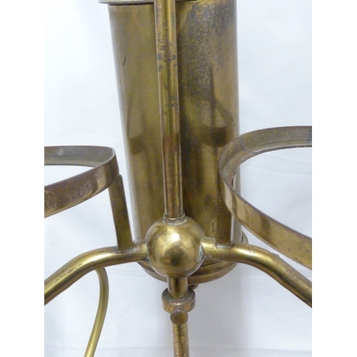 133 - A brass finish reproduction students lamp, with adjustable height two light arms.