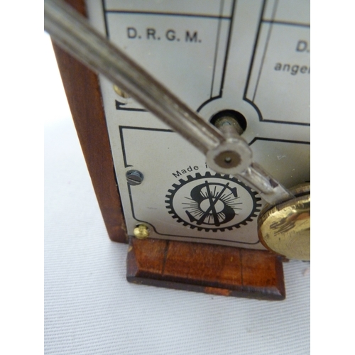 145 - A German traveling clockwork metronome in fitted arch top mahogany case; with a key, 13.5cm high