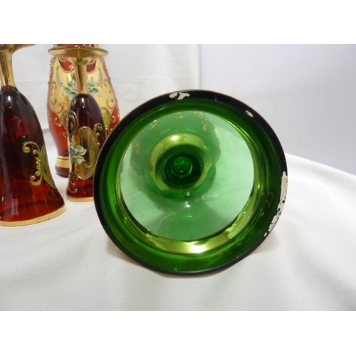 146 - A Bohemian glass decanter and stopper, for the Venetian market, ruby red with impasto enamelled flow... 