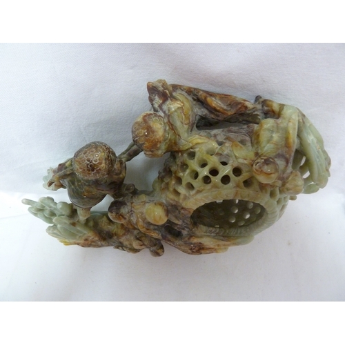 149 - A large Chinese jade carving of telescope gold fish with fan tails, weed, coral and a lobster pot, t... 