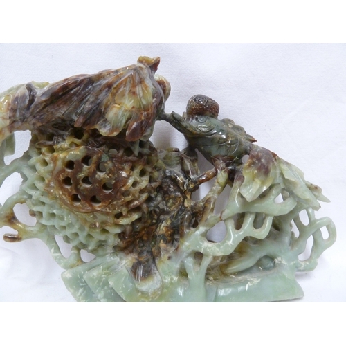 149 - A large Chinese jade carving of telescope gold fish with fan tails, weed, coral and a lobster pot, t... 