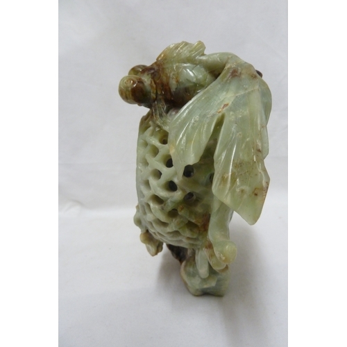 149 - A large Chinese jade carving of telescope gold fish with fan tails, weed, coral and a lobster pot, t... 