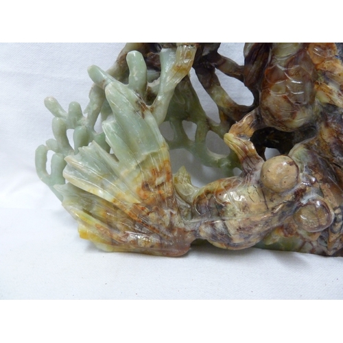 149 - A large Chinese jade carving of telescope gold fish with fan tails, weed, coral and a lobster pot, t... 