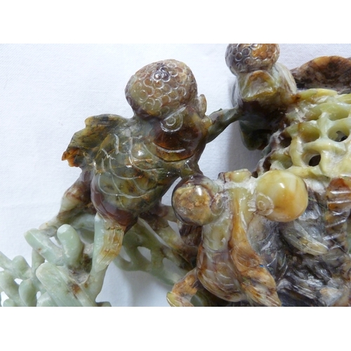 149 - A large Chinese jade carving of telescope gold fish with fan tails, weed, coral and a lobster pot, t... 