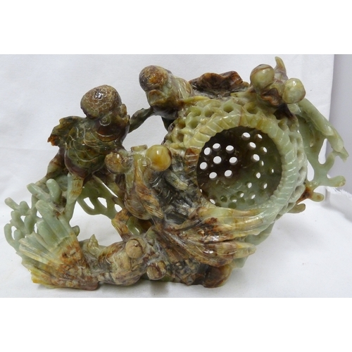 149 - A large Chinese jade carving of telescope gold fish with fan tails, weed, coral and a lobster pot, t... 