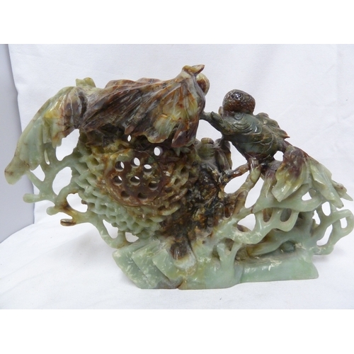 149 - A large Chinese jade carving of telescope gold fish with fan tails, weed, coral and a lobster pot, t... 