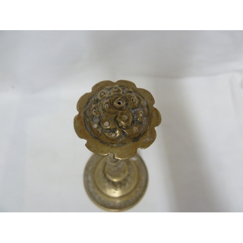 172 - Two brass rose water sprinklers; a small silvered brass coffee pot decorated with flowering sprays a... 