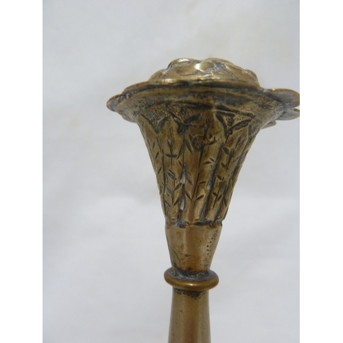 172 - Two brass rose water sprinklers; a small silvered brass coffee pot decorated with flowering sprays a... 