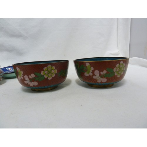 28 - Two Chinese Canton enamel dishes, on circular; and one canted square, decorated in famille rose pale... 