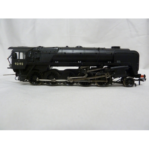 212 - Model Train and Railway Interest - a Hornby 00 gauge Engine, numbered 92192, in black livery; and a ... 