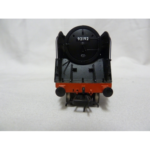 212 - Model Train and Railway Interest - a Hornby 00 gauge Engine, numbered 92192, in black livery; and a ... 