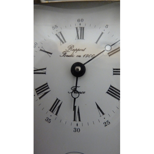 27 - A Rapport Carriage clock, white enamel dial with secondary alarm dial, with key (2)