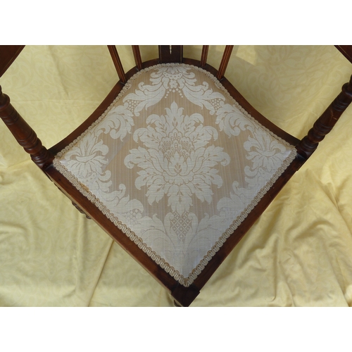 24 - An Edwardian corner chair, with inlaid back rail and arms, pale cream brocade upholstered set, 72cm