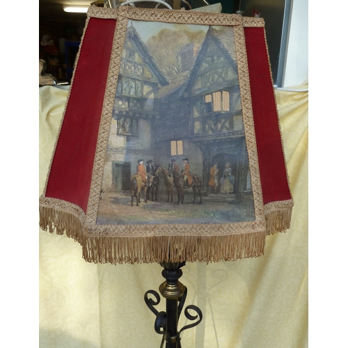 126 - An Arts and Crafts wrought iron and copper telescopic standard oil lamp, in the style of W A S Benso... 