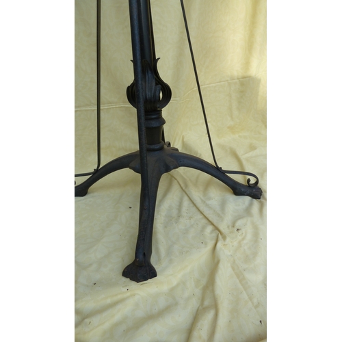 126 - An Arts and Crafts wrought iron and copper telescopic standard oil lamp, in the style of W A S Benso... 